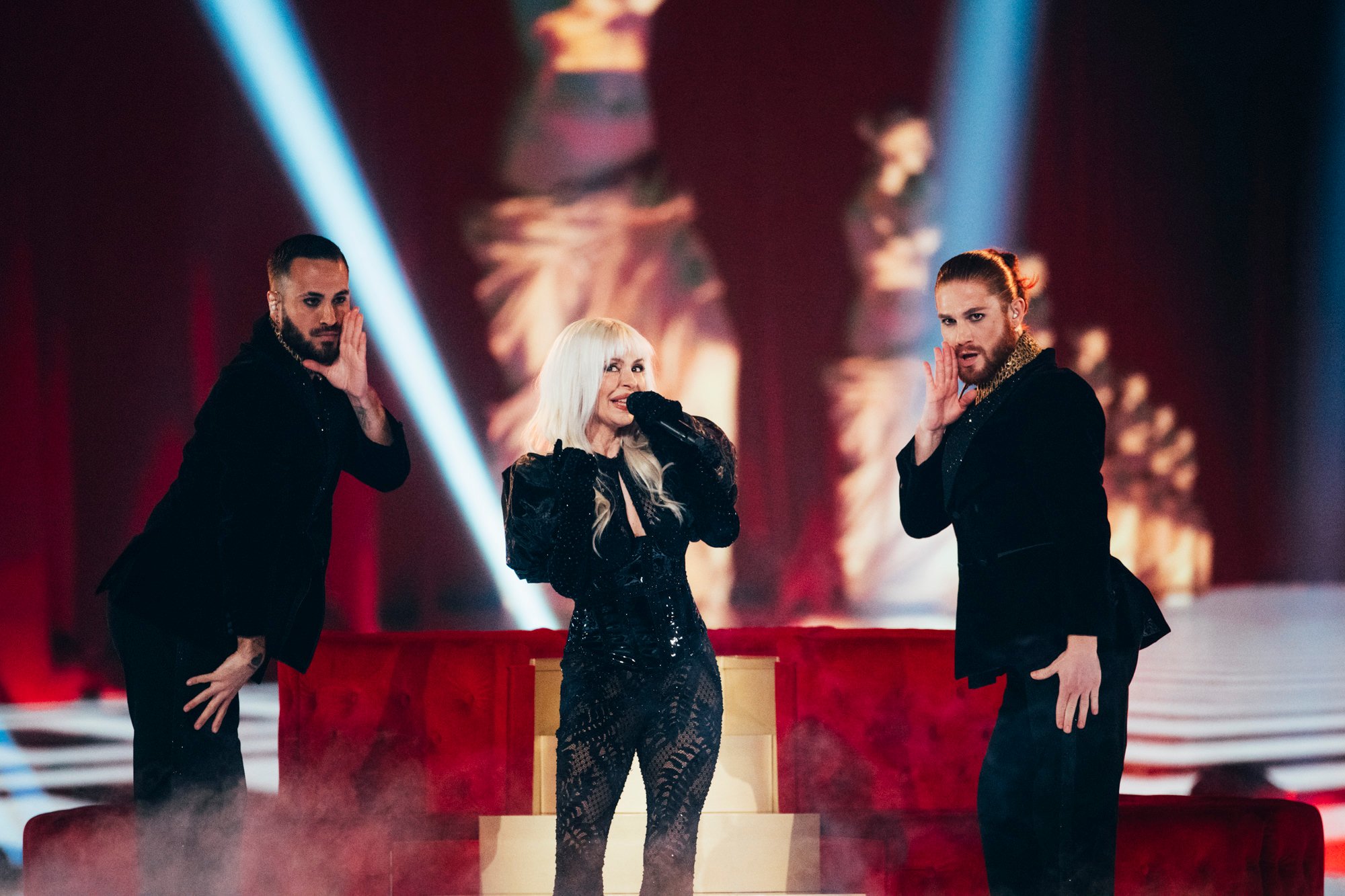 Mery from Nebulossa performing on stage at Eurovision 2024 with two dancers.